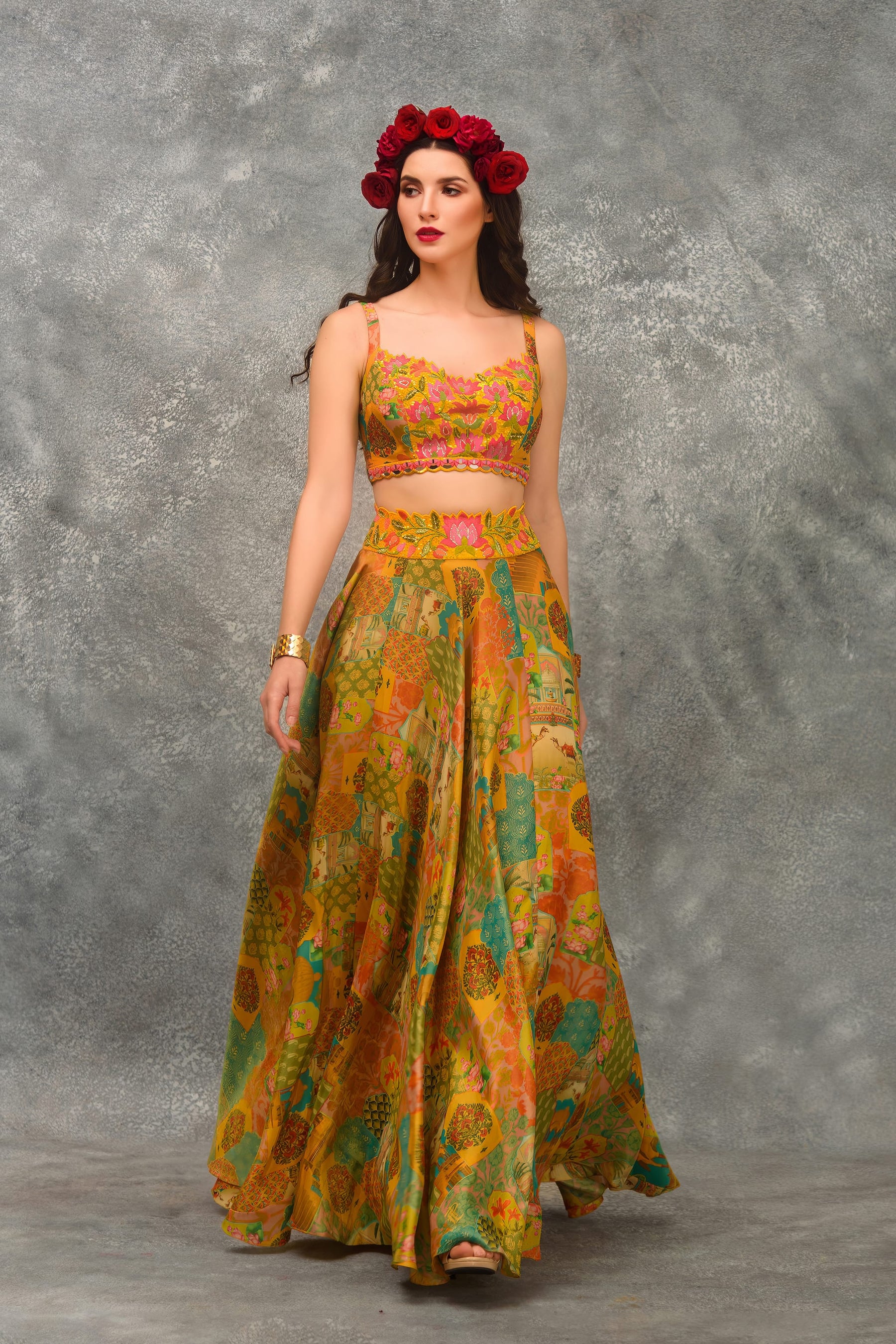 A line Printed skirt with strap blouse and orangnza hand emb Cape