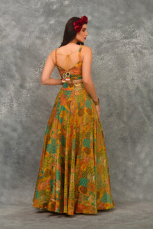 A line Printed skirt with strap blouse and orangnza hand emb Cape